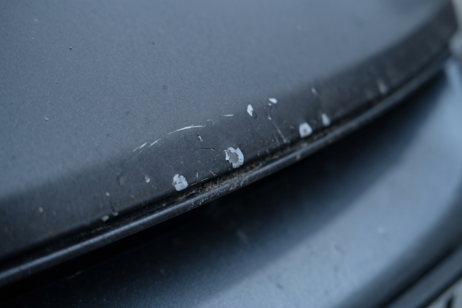 Stone chip damage on vehicle paintwork